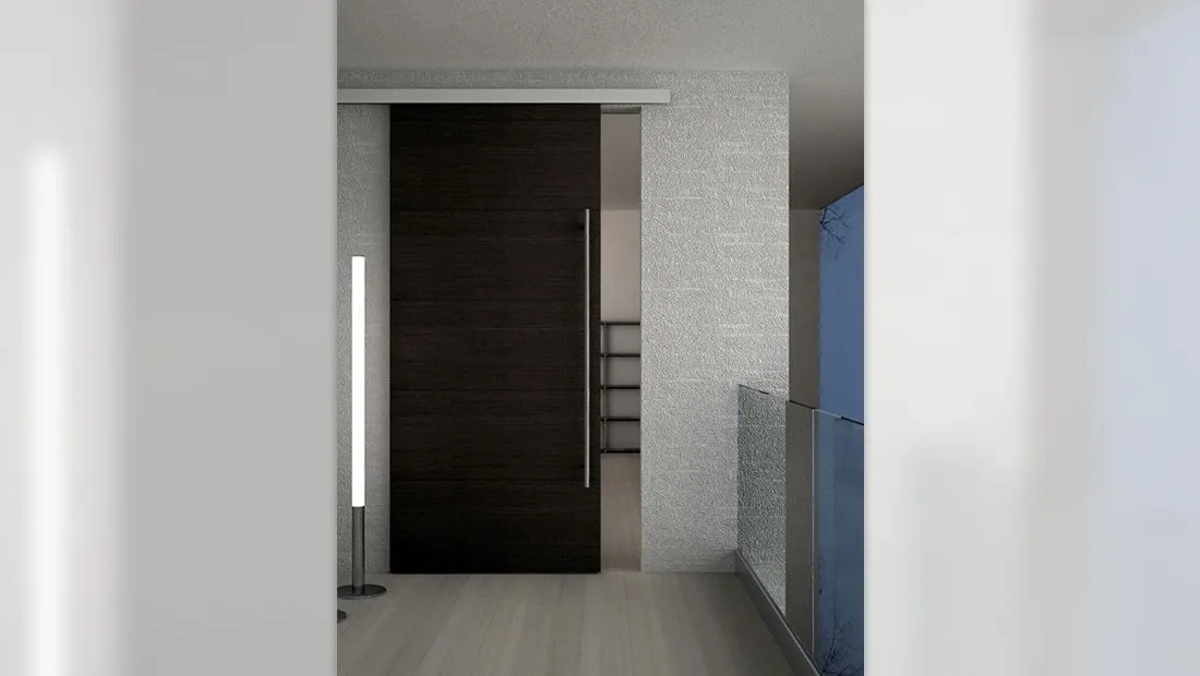 Porta scorrevole filomuro con integrazione discreta